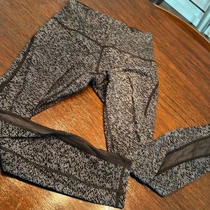 Black and white dot with mesh cutouts Lululemon leggings